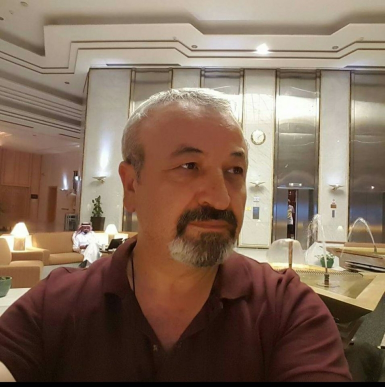Ихсан Кожа, жүк жайгаштыруу боюнча адис. 