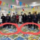 "Балдар оонап ойногон жерге бут кийим менен чыккан". Чүйдөгү бала бакчанын ачылышындагы сүрөт талкуу жаратты