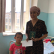 Чек ара чырында жарым-жартылай укпай калган беш жашар Айжаз туулгандыгы тууралуу күбөлүгүн алды