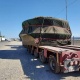 Токтогул ГЭСин реабилитациялоо: Салмагы 76 тонна болгон жаңы шайман өлкөгө алып келинди