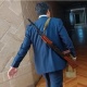 Депутат Жусупбек Коргонбай уулу Жогорку Кеңешке муляж автомат көтөрүп келди